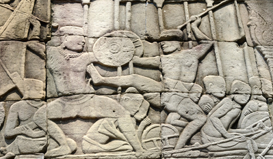 Wall engravings of people practising bokator at the Bayon temple part of the Angkor temples complex